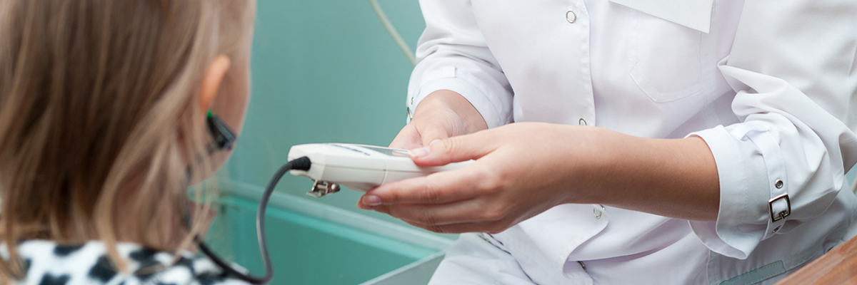 Young girl having a hearing test