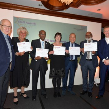 NHS 70 long service winners being presented their awards